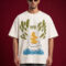 Front view of a man wearing a premium off-white oversized t-shirt featuring a "Laya" (लय) graphic with abstract balancing stones, green leaves, and blue water motifs.