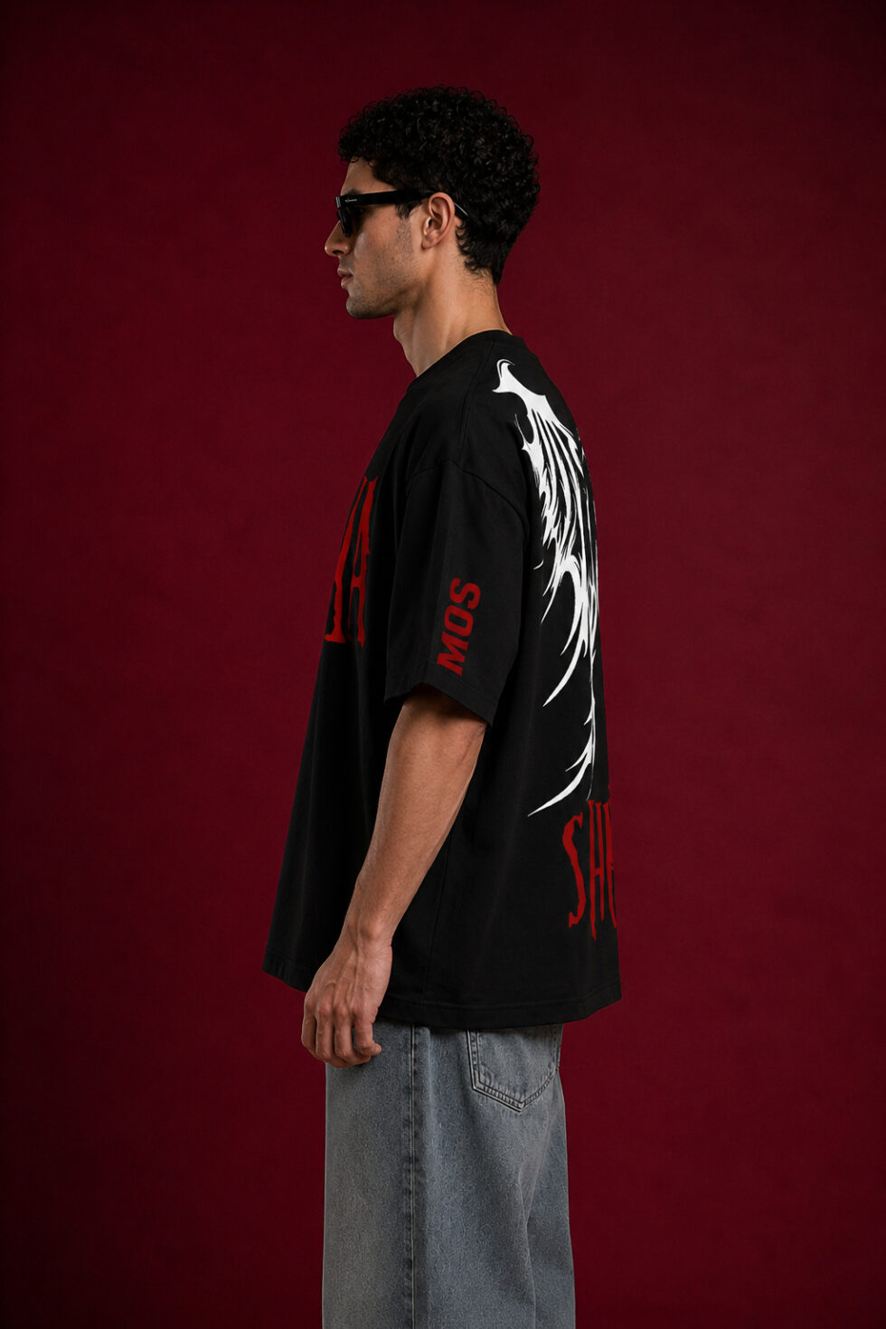 male model wearing the MoreOnStore MOS SHUNYA oversized black t-shirt