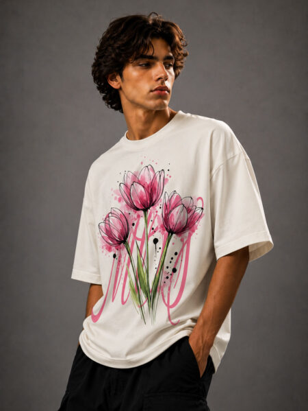 MOS oversized off-white t-shirt featuring pink watercolor tulip floral graphic print on premium cotton fabric worn by male model