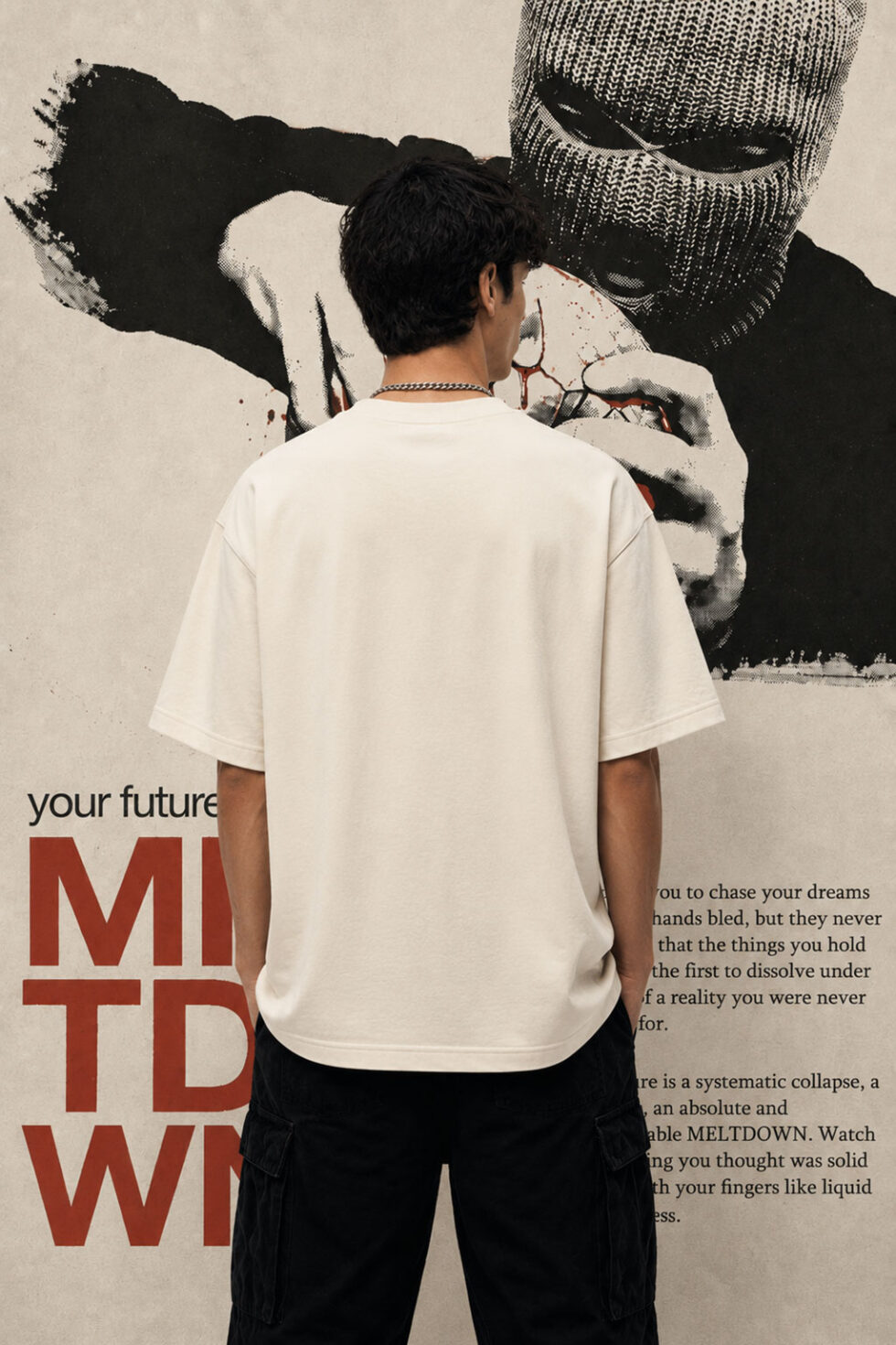 Rear view of a person wearing an off-white, minimalist oversized t-shirt against an industrial-textured backdrop, emphasizing the premium quality and structure of the heavyweight fabric