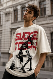 Premium oversized cream graphic t-shirt for men featuring Smoke Today skeleton gas mask artwork with bold streetwear print.