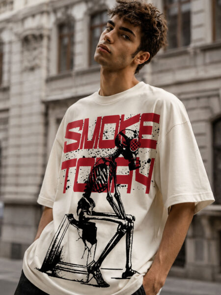 Premium oversized cream graphic t-shirt for men featuring Smoke Today skeleton gas mask artwork with bold streetwear print.